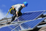 solar installer (photo Greens MPs)